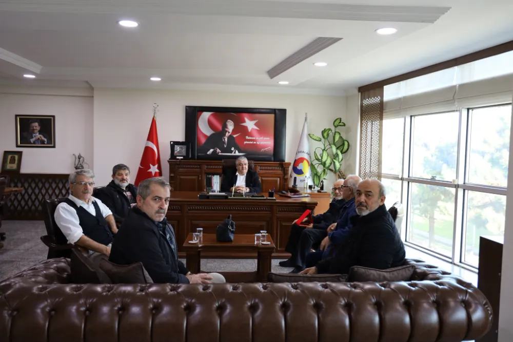 ÜNHADER’den ÜTB Başkanı Mustafa Uslu’ya Teşekkür Plaketi